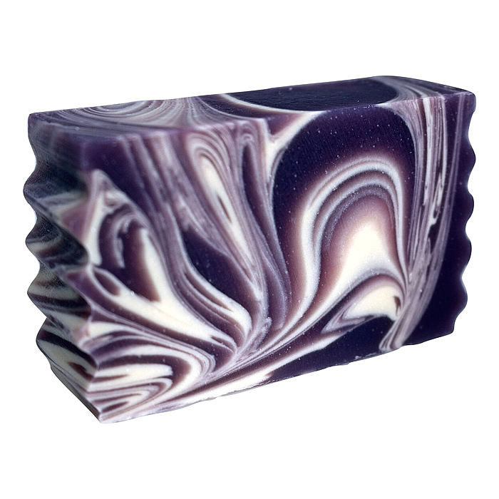 Huckleberry Goat Soap bar with purple and white swirls handcrafted in Montana
