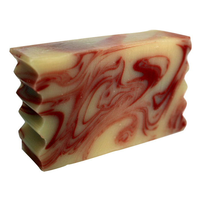 Citrus Sun Goat Milk Soap bar with red and cream swirls, handcrafted, natural moisturizing glycerin, made in USA