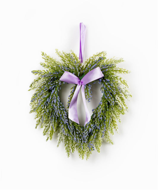 Heart-shaped lavender twig wreath decorated with purple ribbon bow